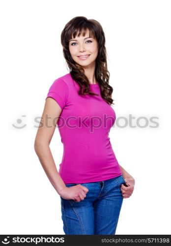 Beautiful brunette young woman in casuals standing with charming bright smile - isolated