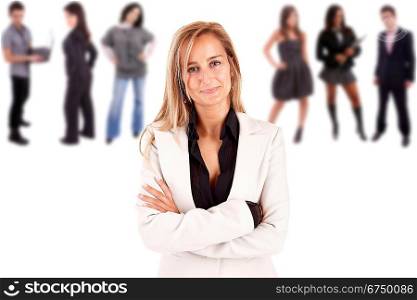 Beautiful business woman posing with group of people in the back
