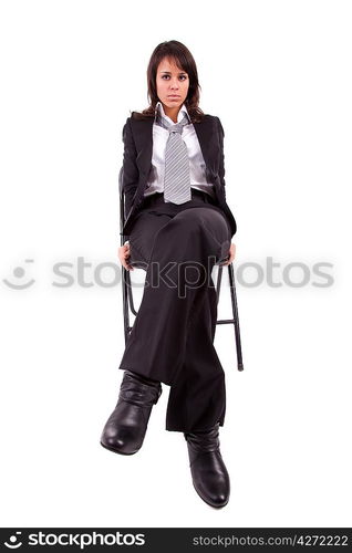 Beautiful business woman sitting on a chair