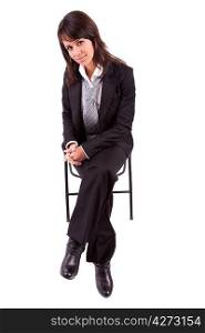 Beautiful business woman sitting on a chair