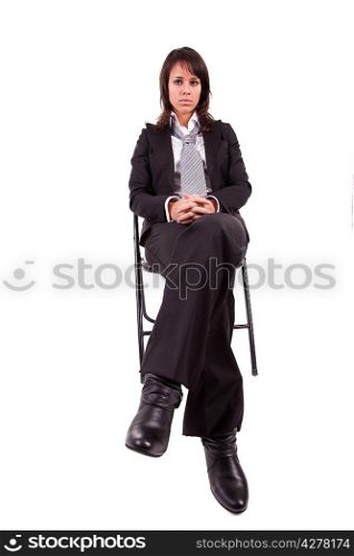 Beautiful business woman sitting on a chair