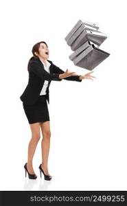 Beautiful business woman stumble while carrying lots of folders on hands, isolated over white background
