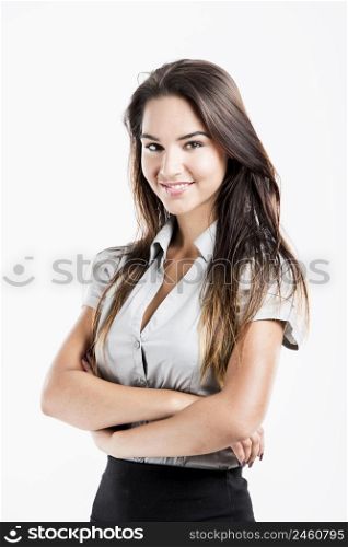 Beautiful business woman with hands folded and smiling, isolated on white background
