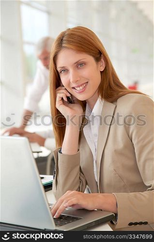 Beautiful businesswoman talking on the phone