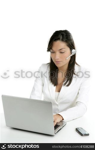 Beautiful businesswoman with headset telephone in white background