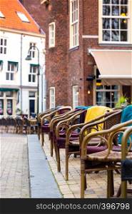 beautiful cafe on the street of the European city. tables and chairs on the street