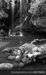 Beautiful calm black and white waterfall landscape at Roughting . Stunning black and white waterfall landscape at Roughting Linn in Northumberland National Park in England