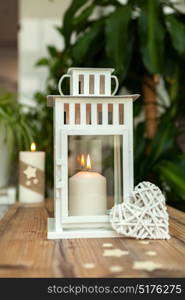 Beautiful Candles in home. Warm christmas decoration