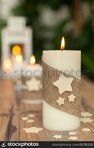 Beautiful Candles in home. Warm christmas decoration