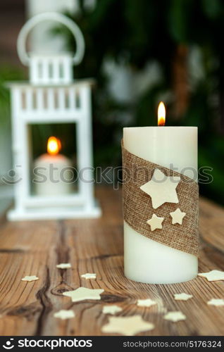 Beautiful Candles in home. Warm christmas decoration