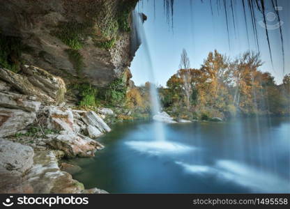 Beautiful cascade at dusk in Pedrosa de Tobalina, Burgos, Spain.