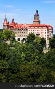beautiful castle Zamek Ksiaz on a hill near of town Walbrzych at the Poland