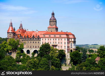 beautiful castle Zamek Ksiaz on a hill near of town Walbrzych at the Poland