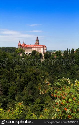 beautiful castle Zamek Ksiaz on a hill near of town Walbrzych at the Poland