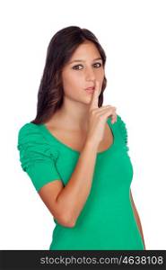 "Beautiful casual girl with a gesture of "shh" isolated on a white background"