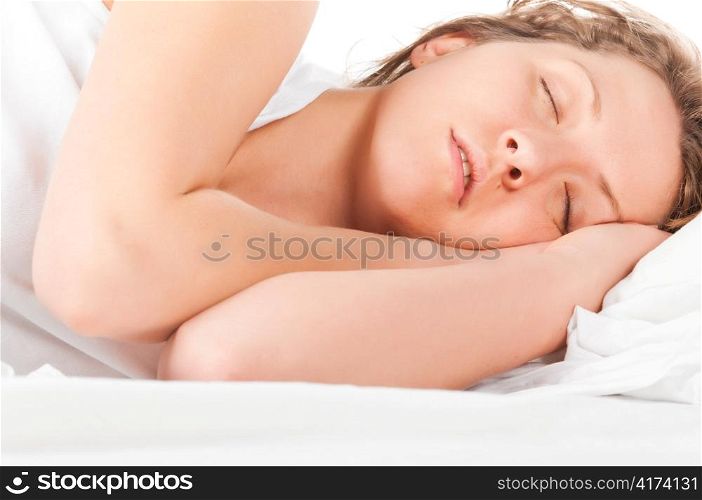 beautiful caucasian woman is sleeping in bed at morning