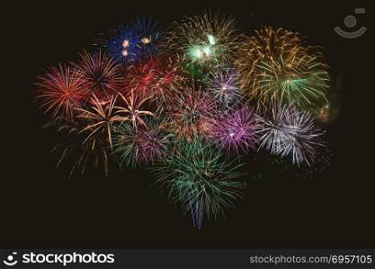 Beautiful celebration multicolored fireworks. Independence Day, New Year holidays salute. 4th of July beautiful fireworks.. Beautiful celebration multicolored fireworks