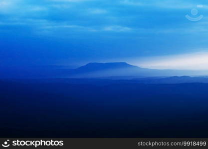 Beautiful charming dramatic sunset sunset sky wide and high mountain landscape Pha Yieb Mek in Phu Kradueng National park. Loei, Thailand.