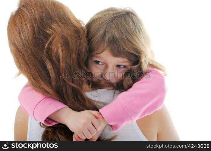 beautiful cheerful girl hugs her young mother. Isolated on white background