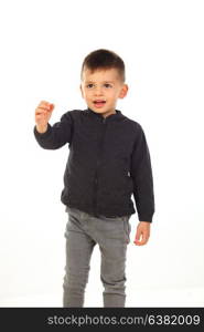 Beautiful child counting with his fingers isolated on a white background