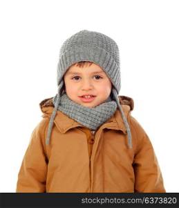 Beautiful child with wool scarf and coat isolated on a white background