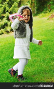 beautiful children posing in fashionable clothing outdoor