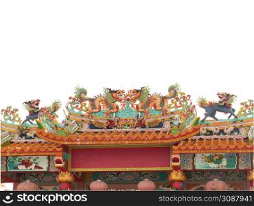 Beautiful Chinese dragon-headed unicorn statue on the temple roof. Kylin or Kirin on roof in Chinese temple.
