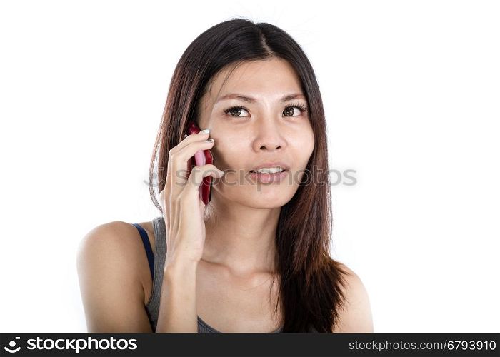 Beautiful Chinese woman talking on smartphone