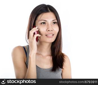 Beautiful Chinese woman talking on smartphone