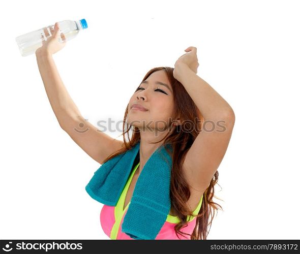 Beautiful Chinese woman with water bottle and towel after workout