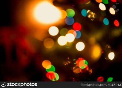Beautiful Christmas background with blurred glowing colorful lights