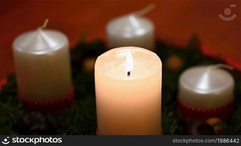 Beautiful Christmas candlelight with candle. Concept for Christmas Winter Time.