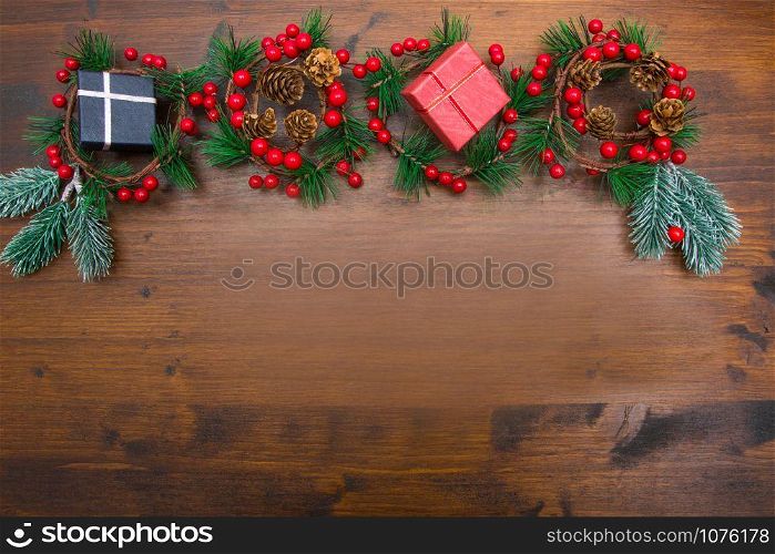 beautiful christmas decoration with fir branches on wood