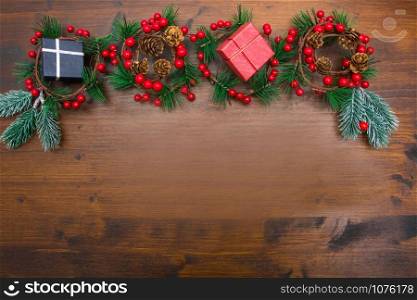 beautiful christmas decoration with fir branches on wood