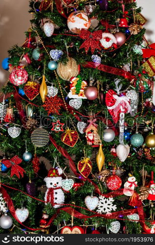 Beautiful Christmas ornaments and decorations hanging in the Christmas tree