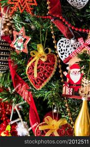 Beautiful Christmas ornaments and decorations hanging in the Christmas tree