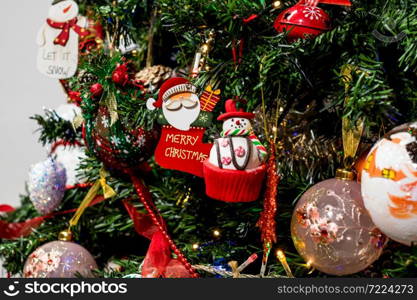 Beautiful Christmas ornaments and decorations hanging in the Christmas tree