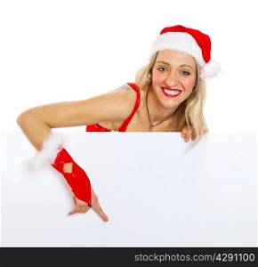 Beautiful christmas woman in santa hat holding empty board