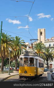 beautiful city sight of the capital of Portugal with yellow typical tram, Lisbon