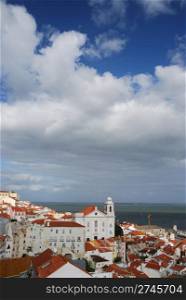 beautiful cityscape view of Santo Estevao church in Lisbon, Portugal