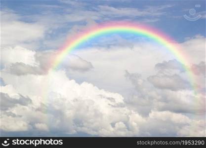 Beautiful Classic Rainbow Across In The Blue Sky After The Rain, Rainbow Is A Natural Phenomenon That Occurs After Rain, Rainbow Consists Of Purple, Indigo Blue, Blue, Green, Yellow, Orange And Red.