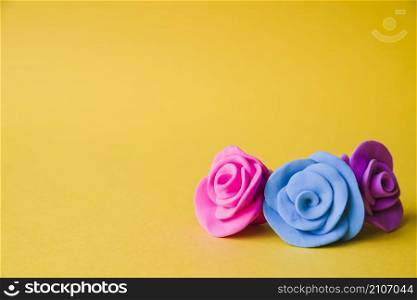 beautiful clay roses yellow backdrop