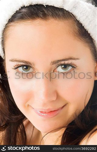 beautiful close up of a pretty girl with dark hair and fair eyes