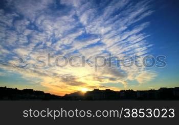 Beautiful clouds at sunset time lapse.Explosion of colors at sunset.Colorful dusk.Dramatic red sky.Awesome clouds at sunset.Spectacular and wonderful sunset.