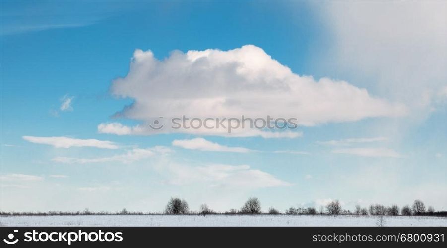 Beautiful cloudscape and white clear surface of snow till flat horizon