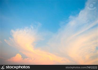 Beautiful cloudscape with blue sky and fluffy clouds at sunset