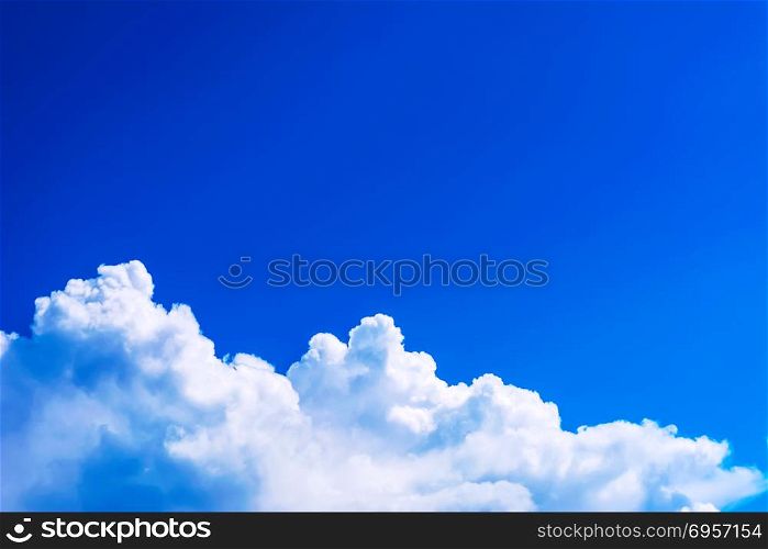 Beautiful cloudy blue sky background copy space. Clear blue sky with fluffy clouds. . Beautiful cloudy blue sky background copy space