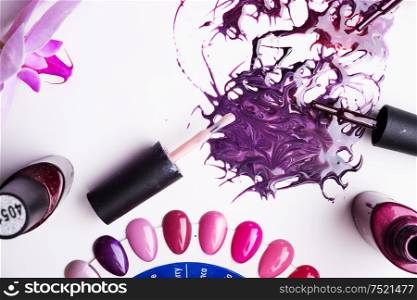 beautiful colorful abstract nail gel polish texture with applicator and palette