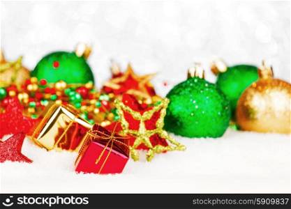 Beautiful colorful christmas decoration in snow