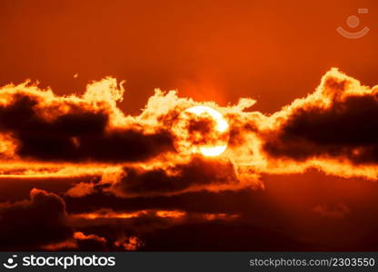 Beautiful colorful orange sky with clouds at sunset